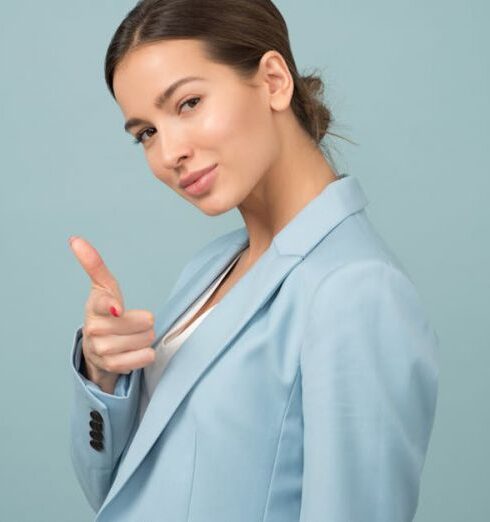 Confidence - Woman Wearing Blue Shawl Lapel Suit Jacket