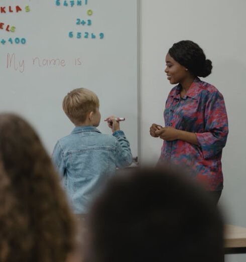 Learning - A Student Standing in front of a Class