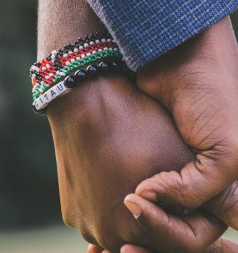 Relationships - close-Up Photo of Two Person's Holding Hands