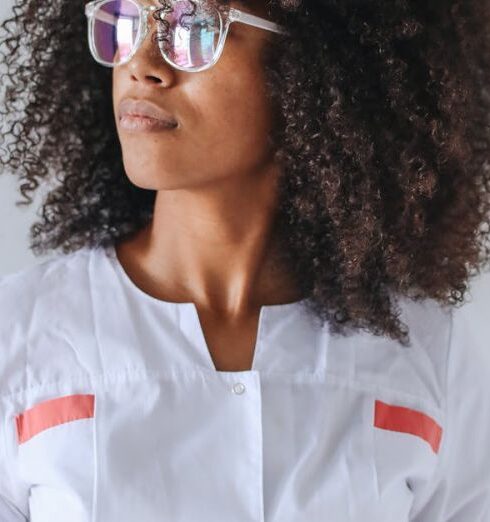 Traits - Woman in White Button Up Dress Wearing Sunglasses