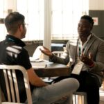 Mentoring - Photo of Men Having Conversation