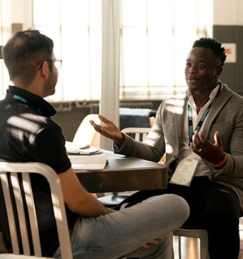 Mentoring - Photo of Men Having Conversation