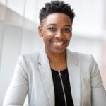 Confidence - Woman Wearing Gray Notch Lapel Suit Jacket