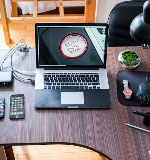 Technology - Black and White Laptop Computer on Brown Wooden Desk