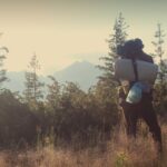 Sleeping Bag - Man Standing on Green Grass