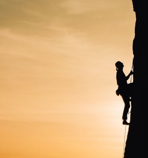 Climbing - Person Rock Climbing