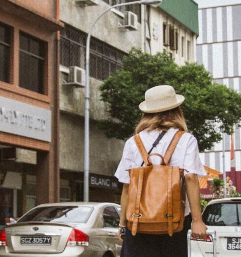 Traveling - View of a Woan on City Street