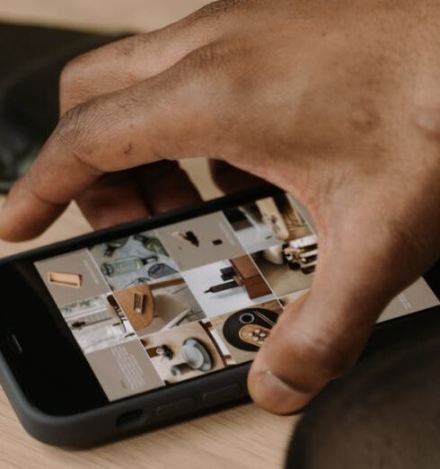 Usage - Close-Up Shot of a Person Holding a Smartphone