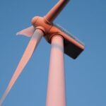 Alternatives - Wind Turbine Standing Against a Clear Sky