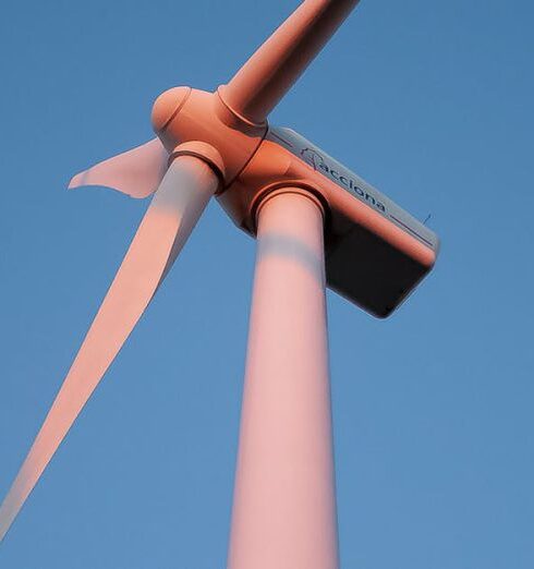 Alternatives - Wind Turbine Standing Against a Clear Sky