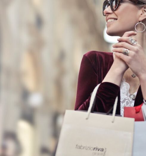 Shopping - Photo of a Woman Holding Shopping Bags