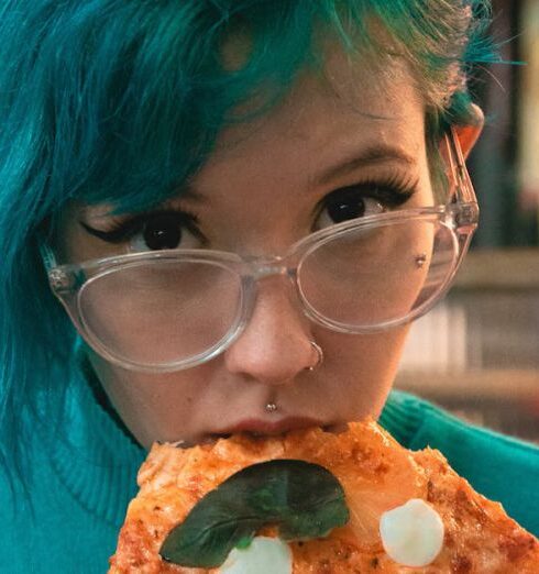 Eating - Green-haired Woman Eating Pizza