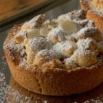 Breaks - Tray of Tarts Sprinkled with Powdered Sugar and Almond Flakes