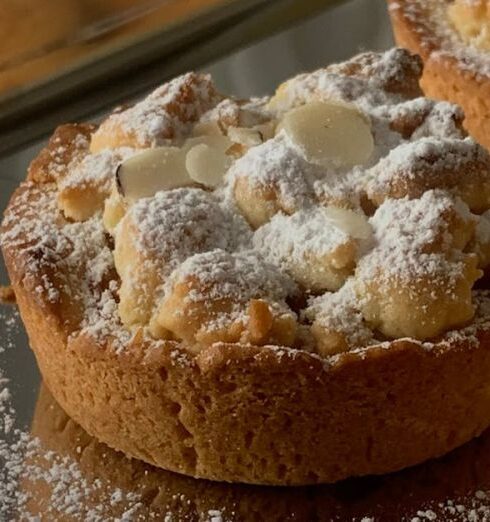 Breaks - Tray of Tarts Sprinkled with Powdered Sugar and Almond Flakes