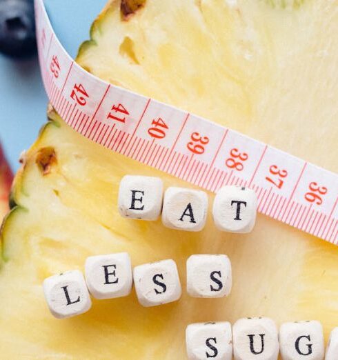 Less - Tape Measure and Letter Blocks on a Sliced Pineapple