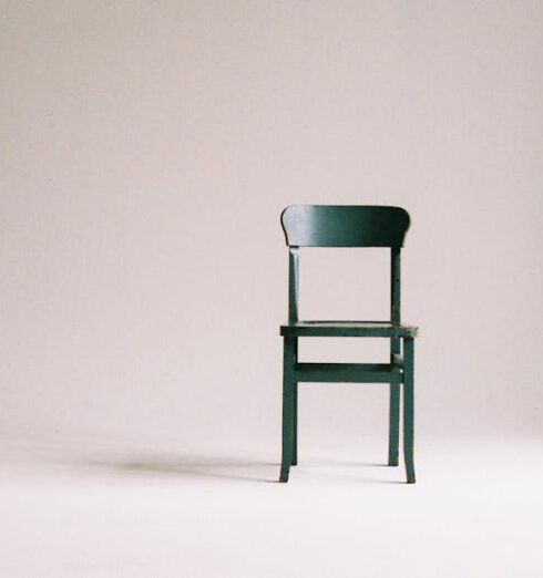 Minimalism - Wooden Chair on a White Wall Studio