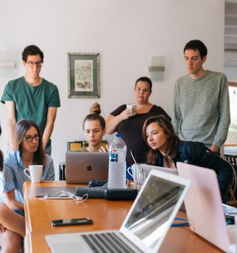 Work - Group of People Watching on Laptop