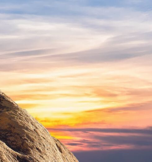 Challenges - Person Climbing on Mountain