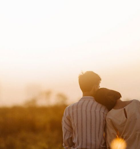 Relationships - Man and Woman Near Grass Field