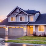 Home - Blue and Gray Concrete House With Attic during Twilight