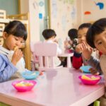 Kids Eating - Three Toddler Eating on White Table