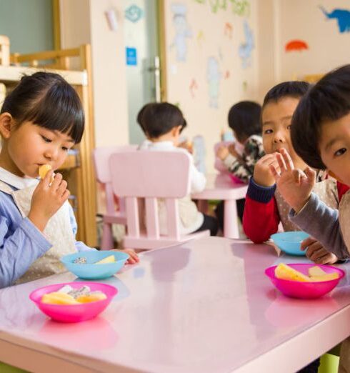 Kids Eating - Three Toddler Eating on White Table