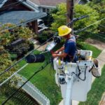 Utilities - Photography of Man Repairing Electrical Wires