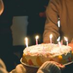 Candle - Two People Holding Cake With Lit Candles