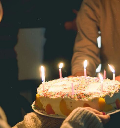 Candle - Two People Holding Cake With Lit Candles