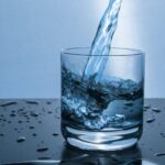 Drink Water - Fluid Pouring in Pint Glass