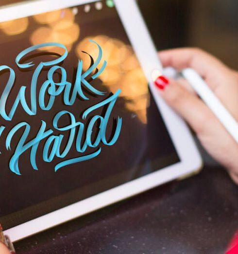 Lettering - Woman Holding White Tablet Computer