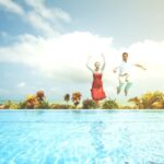 Weekend - Man and Woman Jump on Water