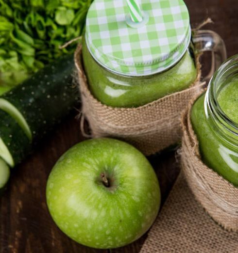 Detox - Green Apple Beside of Two Clear Glass Jars