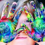 Kids - A KId With Multicolored Hand Paint