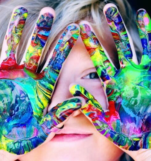 Kids - A KId With Multicolored Hand Paint