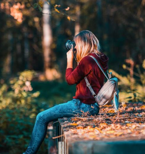 Hobbies - Woman Taking Picture Using Camera