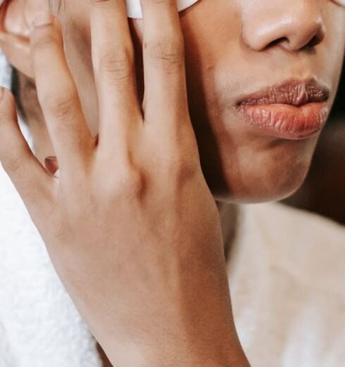 Routine - Woman applying eye patches on face