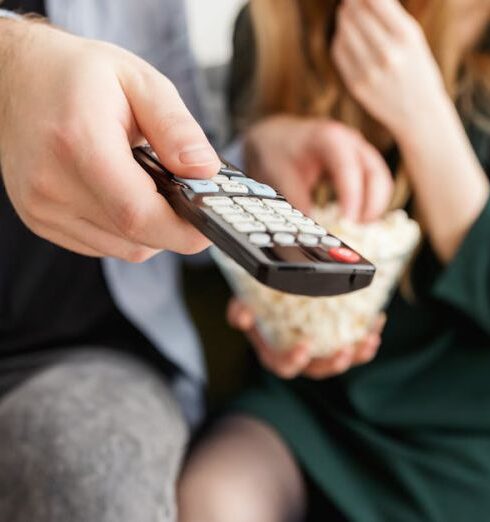 TV - Man Holding Remote Control