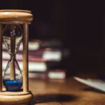 Time - Hourglass on Brown Wooden Frame