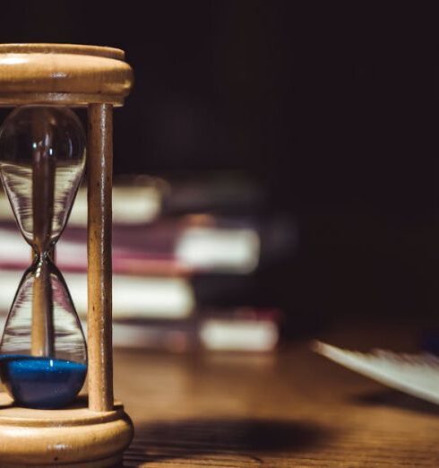 Time - Hourglass on Brown Wooden Frame