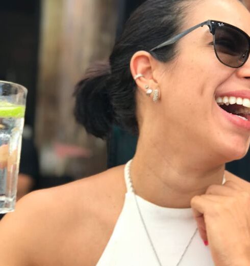 Drink Water - Photo of a Woman Holding a Glass of Water