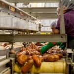 Processing - Woman Cleaning Sweet Potatoes