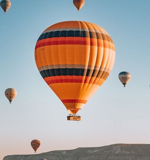 Opportunities - Hot Air Balloons Flying in Sky above Mountains