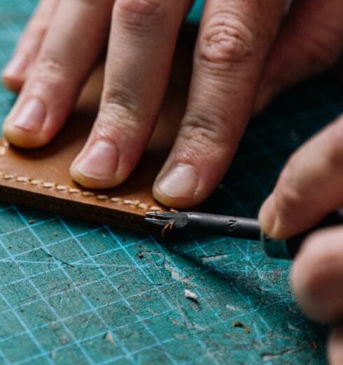 Tools - Person Holding Brown Leather Material