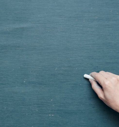 Chalkboard - Person Holding White Chalk