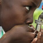 Drink Water - Boy Drinking Water on Faucet