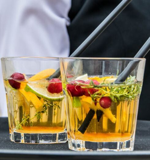 Tray - 2 Whisky Glasses Filled With Beverage on Black Tray