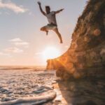 Cliff Diving - Man Jumps from Cliff to Water