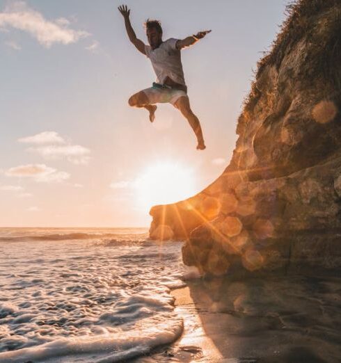 Cliff Diving - Man Jumps from Cliff to Water