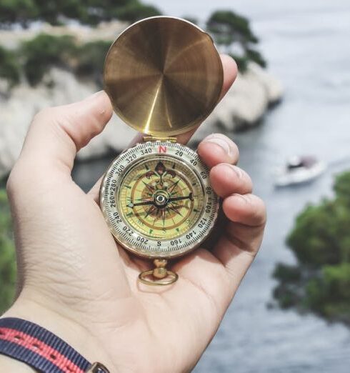 Compass - Person Holding Compass